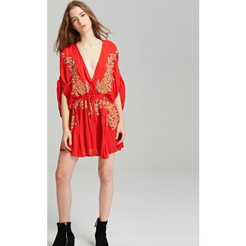 Summer new dress Bohemian tourist island holiday beach dress mini dress V collar sexy embroidery loose dress