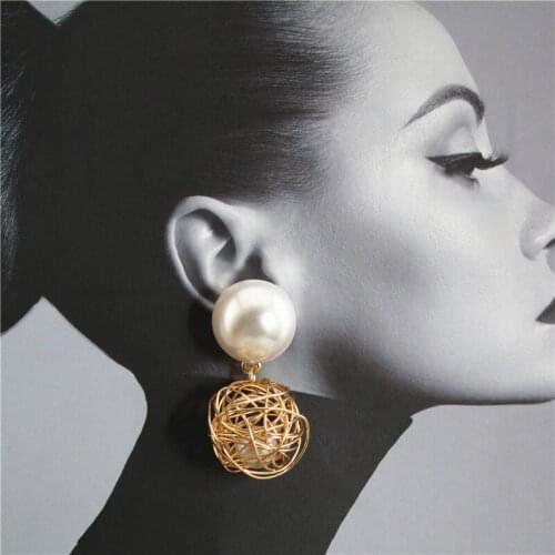 New product 925 silver needle hollow birds nest inlaid pearl elegant chic exquisite earrings without holes ear clip Qingdao