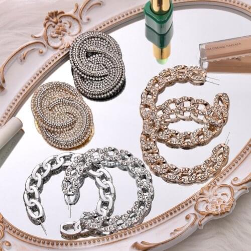 Dvacaman Geometric Hollow CZ Crystal Twist Hoop Earrings for Women Trendy Silver Color Metal Stud Earrings 2020 New Jewelry Gift