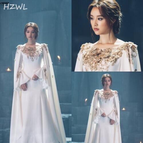 Runway Fashion Dubai Evening Dresses 2021 Gold 3D Appliques Cape Style Prom Dresses Satin Mermaid Long Sleeves Robe De Soiree