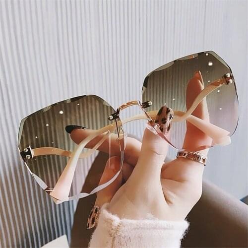Vintage New Frameless Sunglasses Fashion Women Trend Cutting Lens Wave leg Creative Shades Sun Glasses Latest Popular UV400