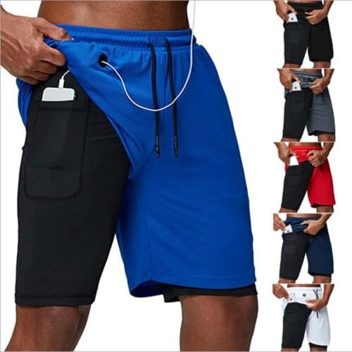 Quick drying leisure fitness shorts double layer anti light function five point pants