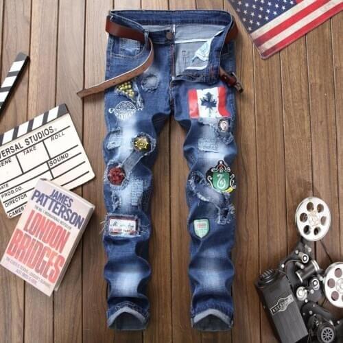 Fashion Mens Washed Jeans Pencil Pants Embroidery Badge Ripped Pants Trousers J36