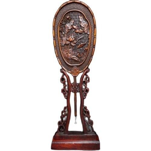 Boxwood is finely carved and has more than one screen decoration every year. Family collection