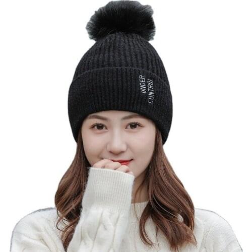 Cashmere thickened letter knitted hat wholesale cycling warm ear cap cold proof wool hat fashion hair ball Hat Women