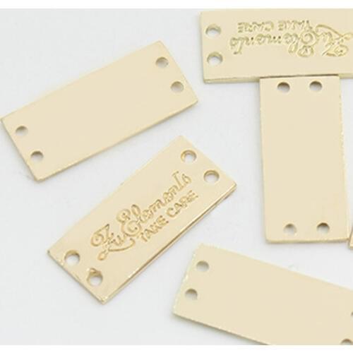 1000PCS Custom 2 holes Metal label embossed clothing decorative hand sewing tags 2.3 * 1 cm