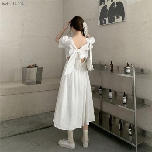 2021 Summer New Dress Long Fashion Niche Back Hollow Bow Super Fairy Fairy Dress Pure Color Waist Temperament White Puff Sleeves