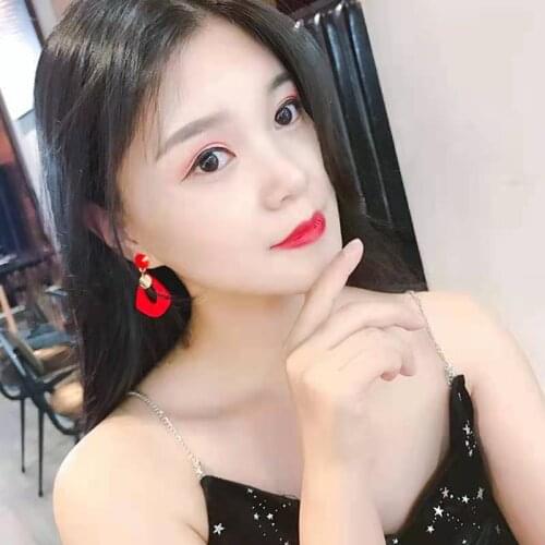 Red Geometry, Internet sensation, and a pair of ear studs