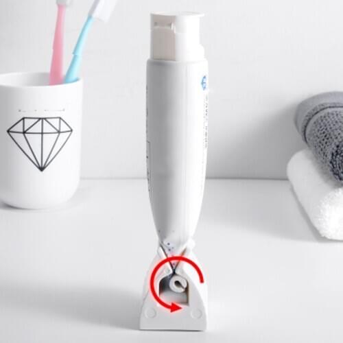 Hot Manual Toothpaste Squeezer Anti-slip Facial Cleanser Squeezer For Bathroom Creative Rotary Squeezing Toothpaste Dispenser