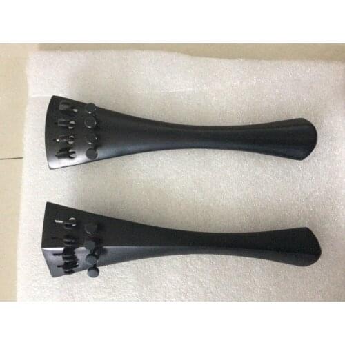 Two pieces of 4/4 size ebony cello tailpieces round and hill model