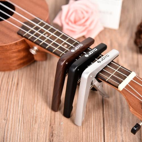 JOYO JCP-01 Light Guitar Capo Quick Change Clamp Key Plastic Steel with Pick for 6-String Acoustic Electric Guitar