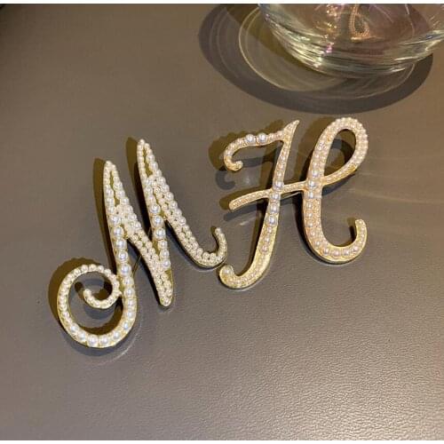 KWHY Brooches