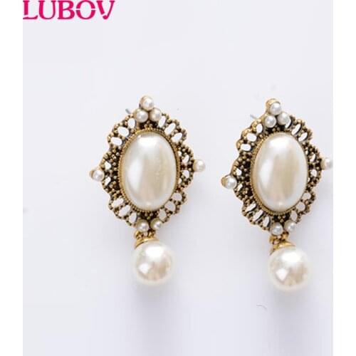 2018 New Fashion Elegant Dangling Simulated Pearl Earrings gold Color for Women Enviromental Anti Allergies Free Shipping