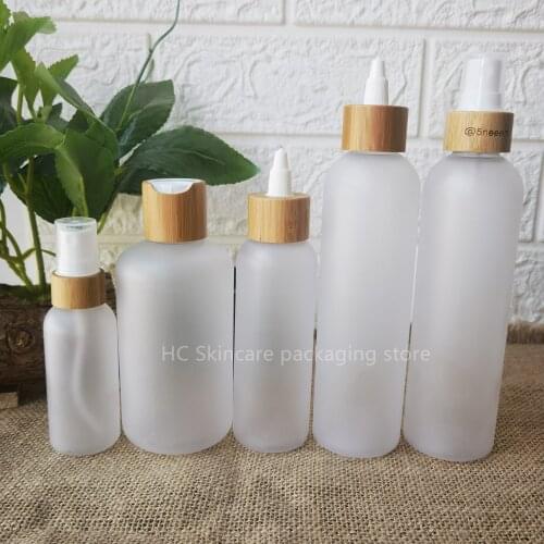 Cosmetic Spray Bottle With Bamboo Lid Frosted Clear Plastic Containers Skin Care Packaging Bottles Beauty Hair Tools Custom Logo