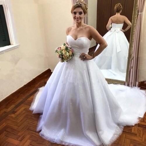Romantic Sweetheart Ball Gown Princess Wedding Dresses Bling Bling Tulle With Bow Belt Sweep Train Bridal Dress Custom Made