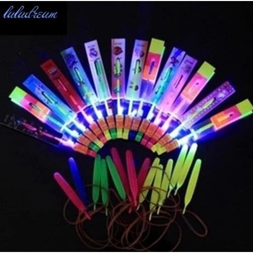 5pcs/lot Luminous With Lamp Rotary Ejection Aircraft Toys For Children Kinds Luminous Ejection Rubber Band Flying Arrow