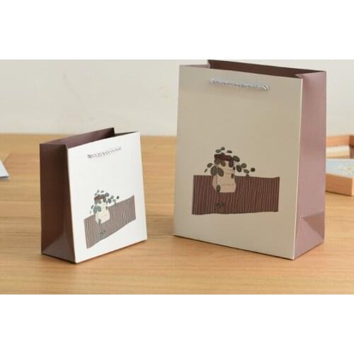 Upscale exquisite CMYK clothing store shopping bags,UV Protected gift packaging paper bags --XP2284