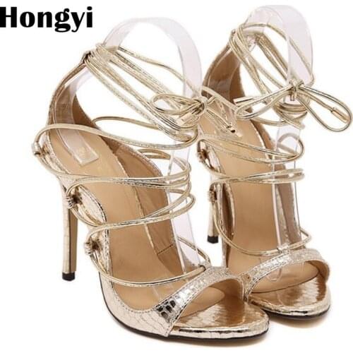 Hongyi Glitter Sandals Sexy Laser Cut Metallic Gladiator Sandals High Heels Lace Up Wedding Shoes Woman Pumps