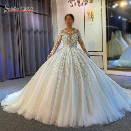 New designer puffy ball gown wedding dress with heavy beading for black bride