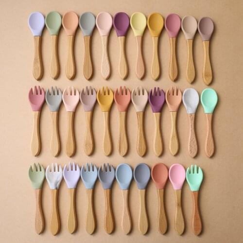 Custom Baby Wooden Handle Fork Spoon Food Grade Silicone Material Baby Feeding Accessories Spoon Organic Soft Tip BPA Free