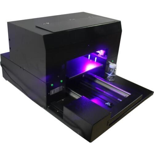 Good quality with 6 year flatbed printer manufacture A3 size UV printer & Phone case , U disk , Business card printing machachi