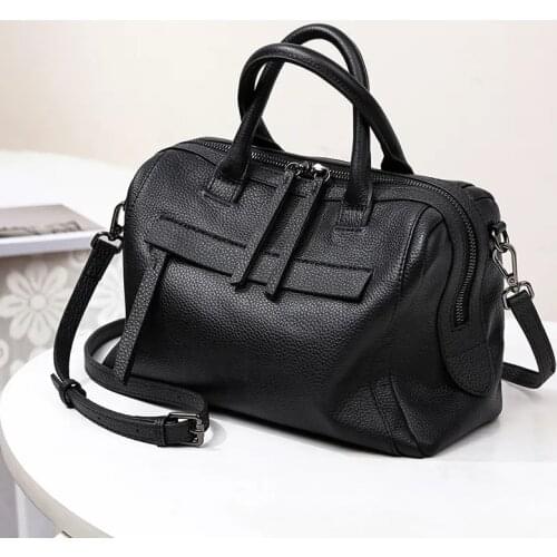 Medium capacity genuine leather travel hand pillow bag