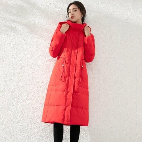 The new winter pure color long thickening in female hooded down jacket to keep warm a undertakes four color feather coat