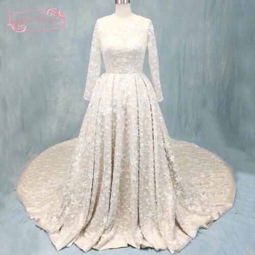 Real wedding dresses sheer crew neckline long transparent pearls star shiny bling bling chapel train bridal dresses actual