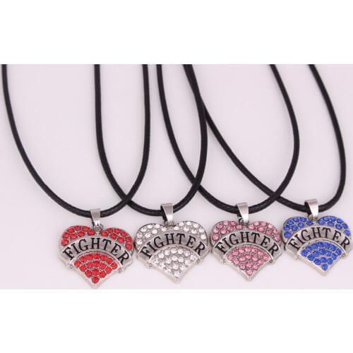 Hot Selling rhodium plated zinc studded with sparkling crystals FIGHTER heart pendant necklace rope chain