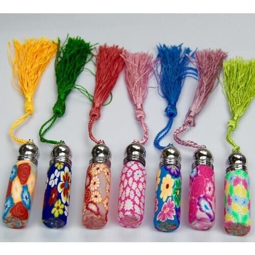 7pcs/lot Free Shipping Hight quality 6ML Copper head bead polymer clay perfume bottles Empty Roller ball bottle Car Pendant