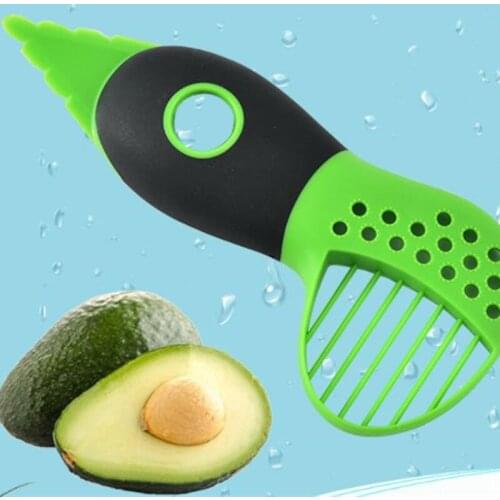 2021 Gadget New Style 4 In 1 Avocado Cutter Slicer Butter Pulp Grind Silicon Grip Pitter Peeler Kitchen Gadget Inteligente