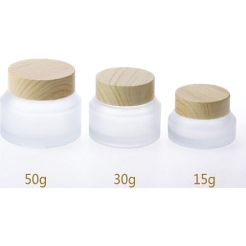 100pcs/lot 15g 30g 50g Jars for Creams Cosmetic Can Set Empty Wood Grain Frosted Glass Portable Cream Box Glass Container F408