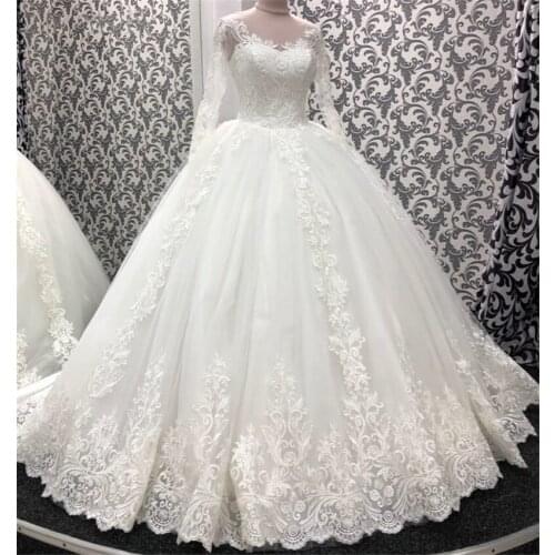 Vintage Long Sleeves Lace Wedding Dresses 2021 Illusion Boat Neck Appliques Ball Gown Court Train Corset Bridal Gowns