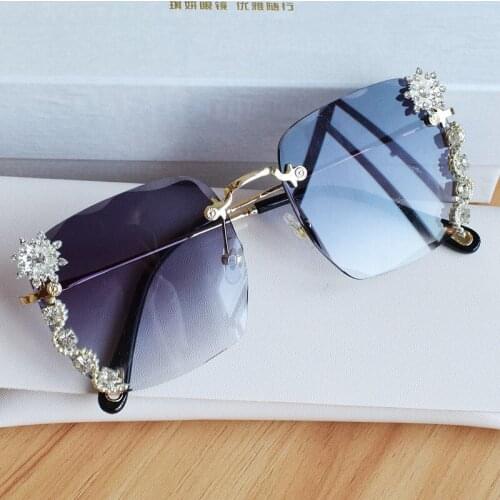 Frameless trend sunglasses Gradient diamond-encrusted pearl luxury sunglasses womens street shooting metal sunglass