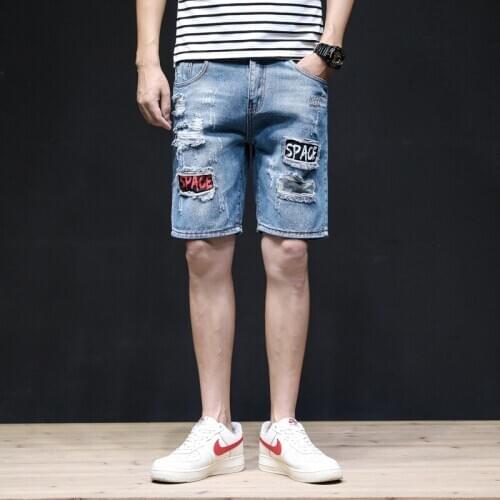 Wholesale 2021 Ripped denim shorts men\s trendy brand camouflage short pants summer Korean breeches men\s slim small pants