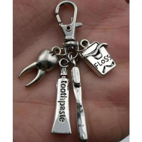 High quality key pendant Dental hygienist keychain Tooth / floss / toothbrush / toothpaste Fast shipping