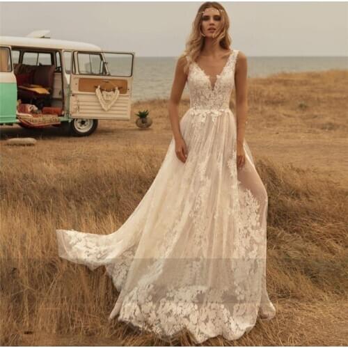 2020 Simple Wedding Dresses For Elegant Brides Deep V Neck Tulle Floor Length Appliqued Lace Backless Country Beach Bridal Gowns