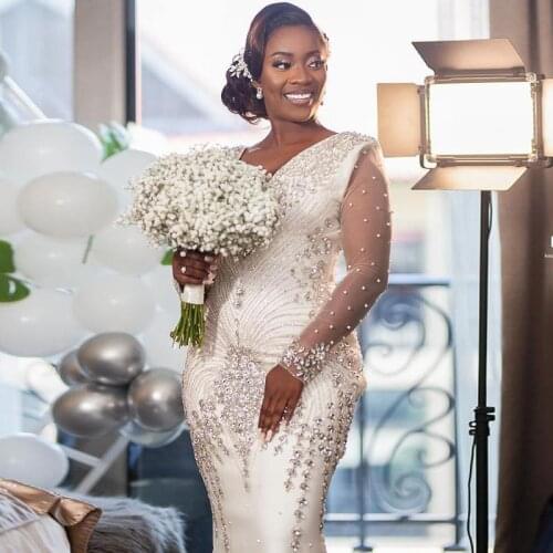 Major Beading Crystals Mermaid Wedding Dresses V Neck Illusion Long Sleeves Luxury Bridal Dress African Aso Ebi vestido de noiva