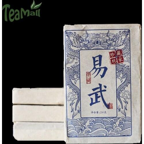 2014 Chinese Raw Puer Chinese Tea Yunnan Yiwu Ancient Tea Tree Sheng Puer Chinese Tea Compressed Tea 250g