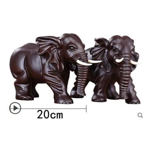 Wood carved elephants are decorated like a pair of ebony solid wood elephants sandalwood carving safety Best wishes Decorative O