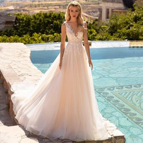 2022 Champagne Wedding Dresses for Bride V Neck Beading Sequin Appliques Tulle A Line Sweep Train Bridal Gowns Backless