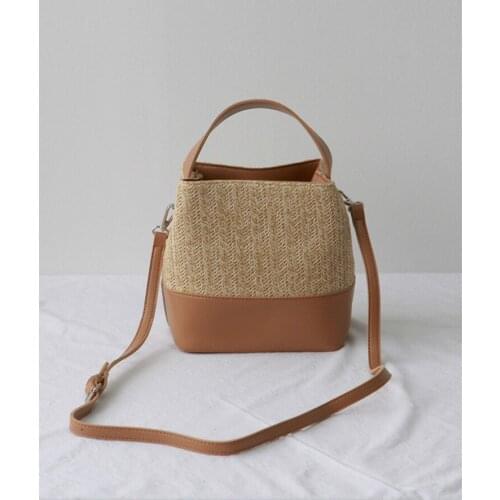 Fresh and simple cross-slung one-shoulder female bag with contrasting colors woven canvas leather versatile bucket bag