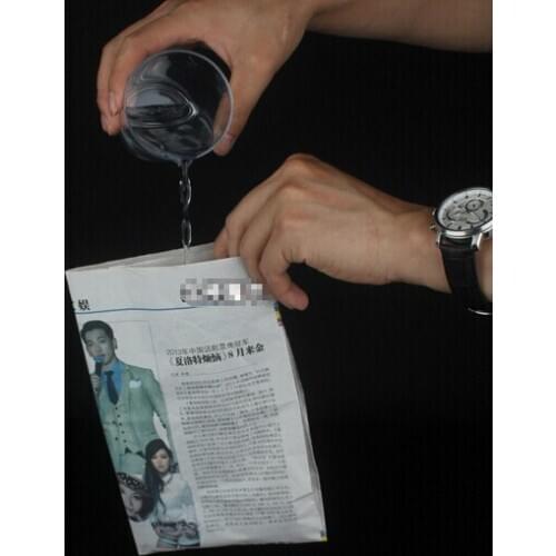 Free shipping Pouring Water Liquid From Newspaper Magic Tricks 10pcs/lot Close Up Tricks Juegos Magia YH171