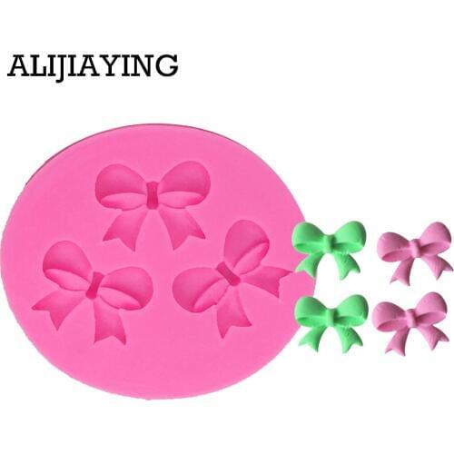 M0162 1Pcs Lovely Bow Tie Shape Cake Mold Food Grade silicone mold,Fondant Cake Decorating Tools,Silicone Border Mould