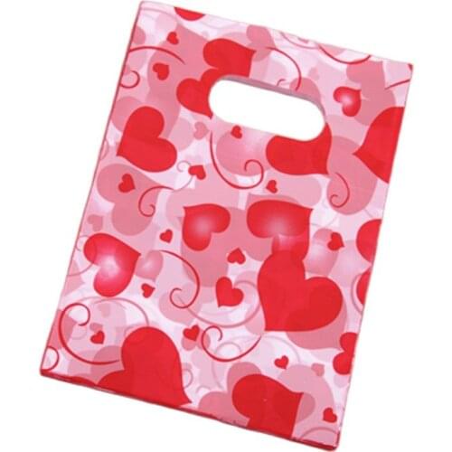 2017 New Design Wholesale 100pcs/lot 13*18cm Red Heart Plastic Packaging Bags Favor Birthday Supply Gift Bags
