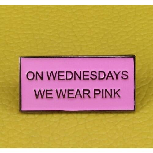 On Wednesdays We Wear Pink Badge Mean Girls is a classic and this line sums everything up pretty perfectly