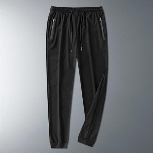 Ice silk summer mens sports casual pants thin elastic quick drying Harlan pants loose nine Leggings large