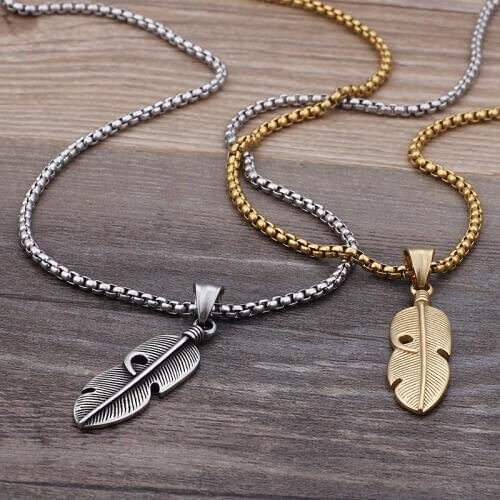 Hip-hop hollow retro titanium steel tide male stainless steel pendant feather pendant