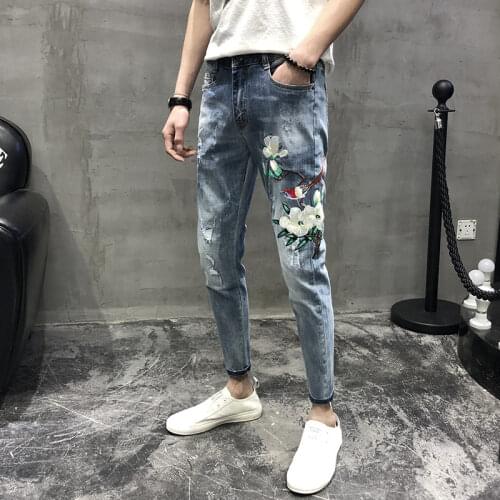 Wind embroidery jeans mens feet pants brand autumn and winter 2021 teenagers pencil pants social people spirit guy pants