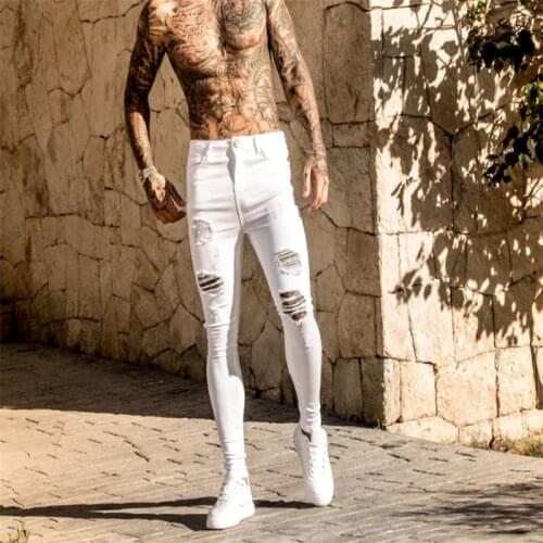 2021 European And American Foreign Trade New Style Mens White Slim-Fit Feet Pants European Station Hole Paint Tether Jeans Men